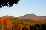 The nearly full moon rises over Camel's Hump as viewed from Texas Hill Road.