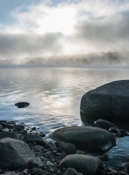 Morning fog burning off Indian Lake in the Adirondacks.