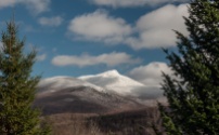 Camel's Hump glows with a mantle of snow and rime yesterday at midday.