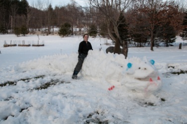 Yesterday's wet snow made for perfect snow-dragon making. Emma & Taylor went to work...