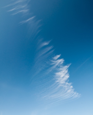 "Mare's tails" cirrus clouds show characteristic wisps.