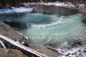Swirling currents crystalized in green ice at Horseshoe Bend on the Huntington River yesterday morning.