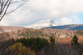 The summit of Camel's Hump catches some afternoon sunlight in this view from our front field.