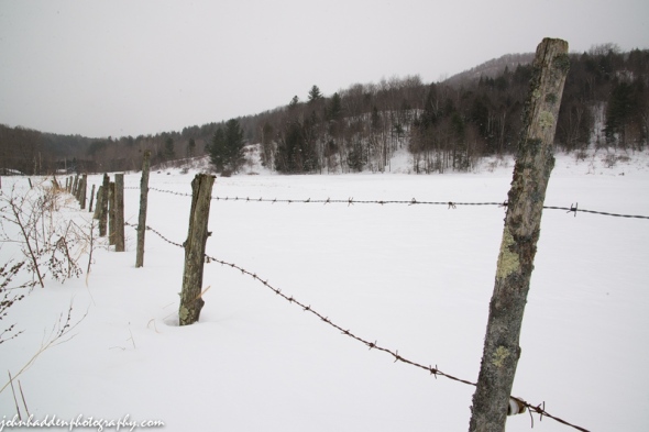 A barbed wire fence line along Shaker Mountain Road