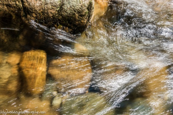 Rushing water paints light scribbles in Texas Brook