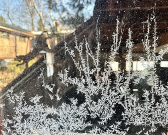 window-frost-reflections